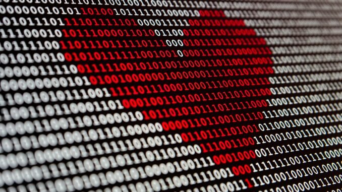 Red heart made out of binary digits illustrating the launch of Nova-3 Medical by Deepgram, an AI speech-to-text (STT) model tailored for transcription in the demanding environment of the healthcare sector.